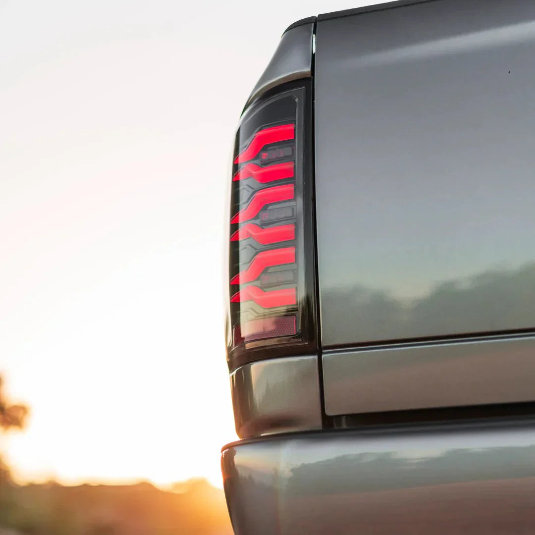 AlphaRex 02-06 Dodge Ram 1500/03-06 Dodge Ram 2500+3500 Luxx-Series LED Tail Lights (Pair) Black