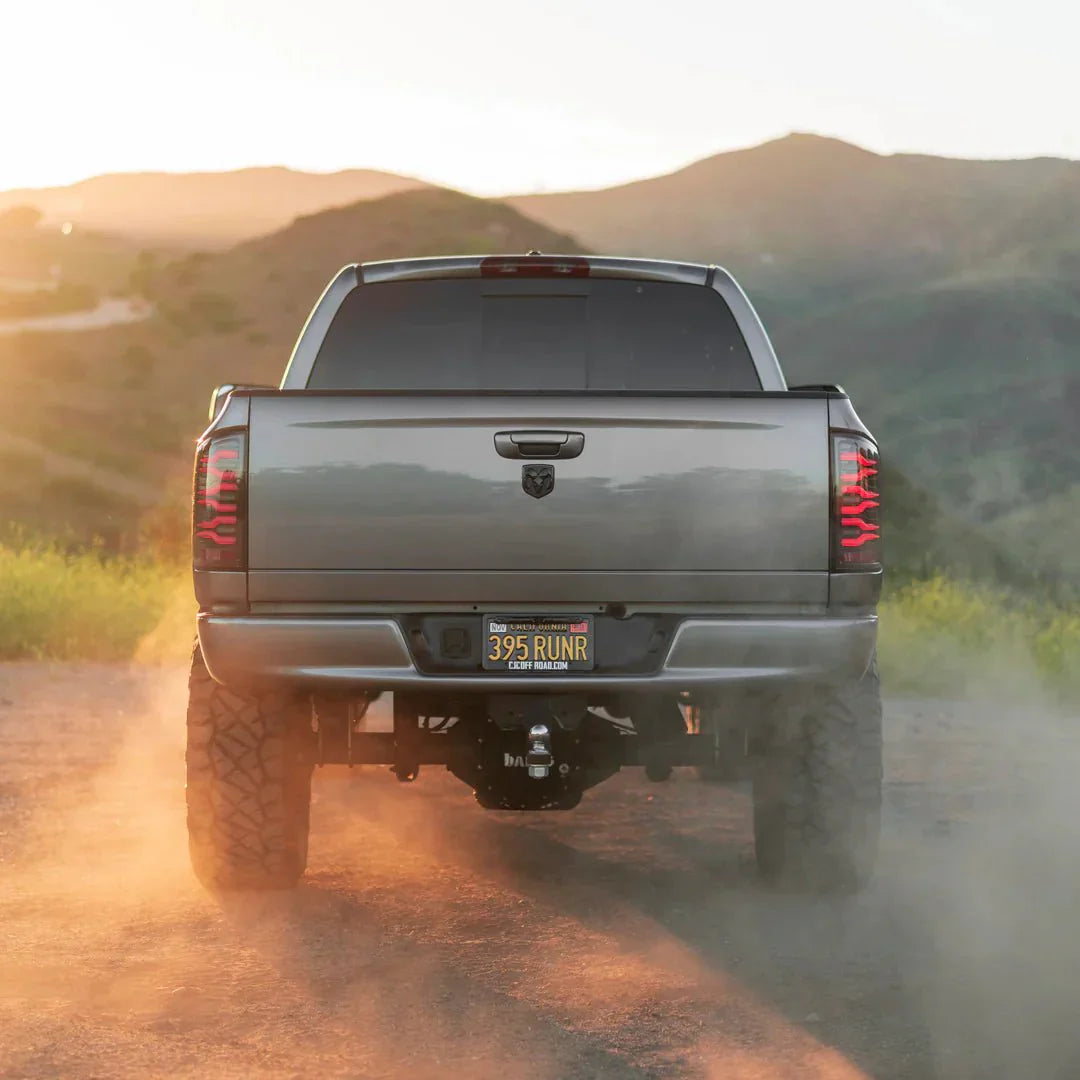 AlphaRex 02-06 Dodge Ram 1500/03-06 Dodge Ram 2500+3500 Luxx-Series LED Tail Lights (Pair) Black