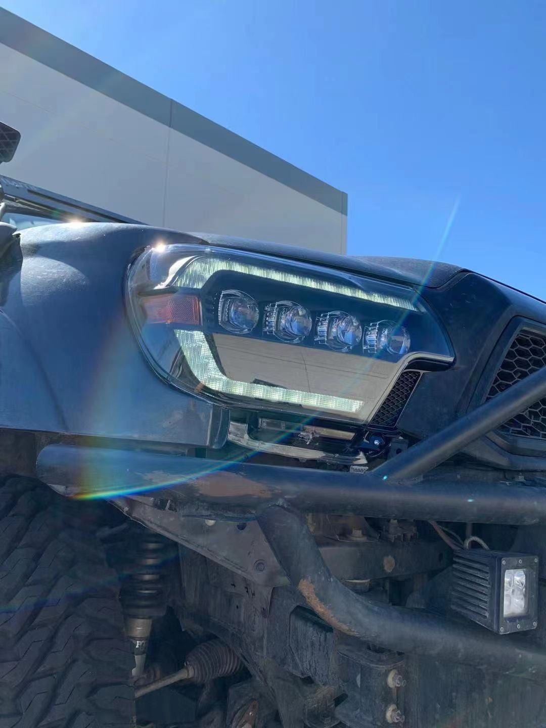 AlphaRex 12-15 Toyota Tacoma NOVA LED Proj Headlights Plank Alpha Blk w/Activ Light/Seq Signal/DRL