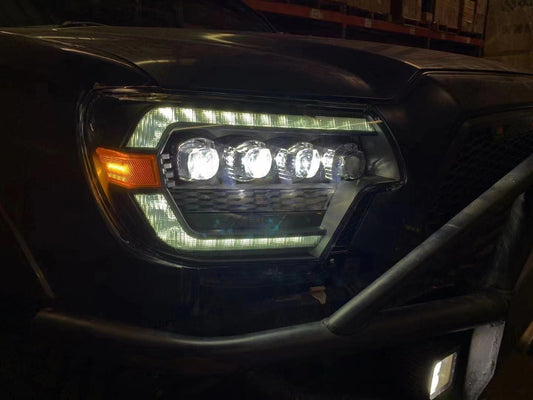 AlphaRex 12-15 Toyota Tacoma NOVA LED Proj Headlights Plank Alpha Blk w/Activ Light/Seq Signal/DRL