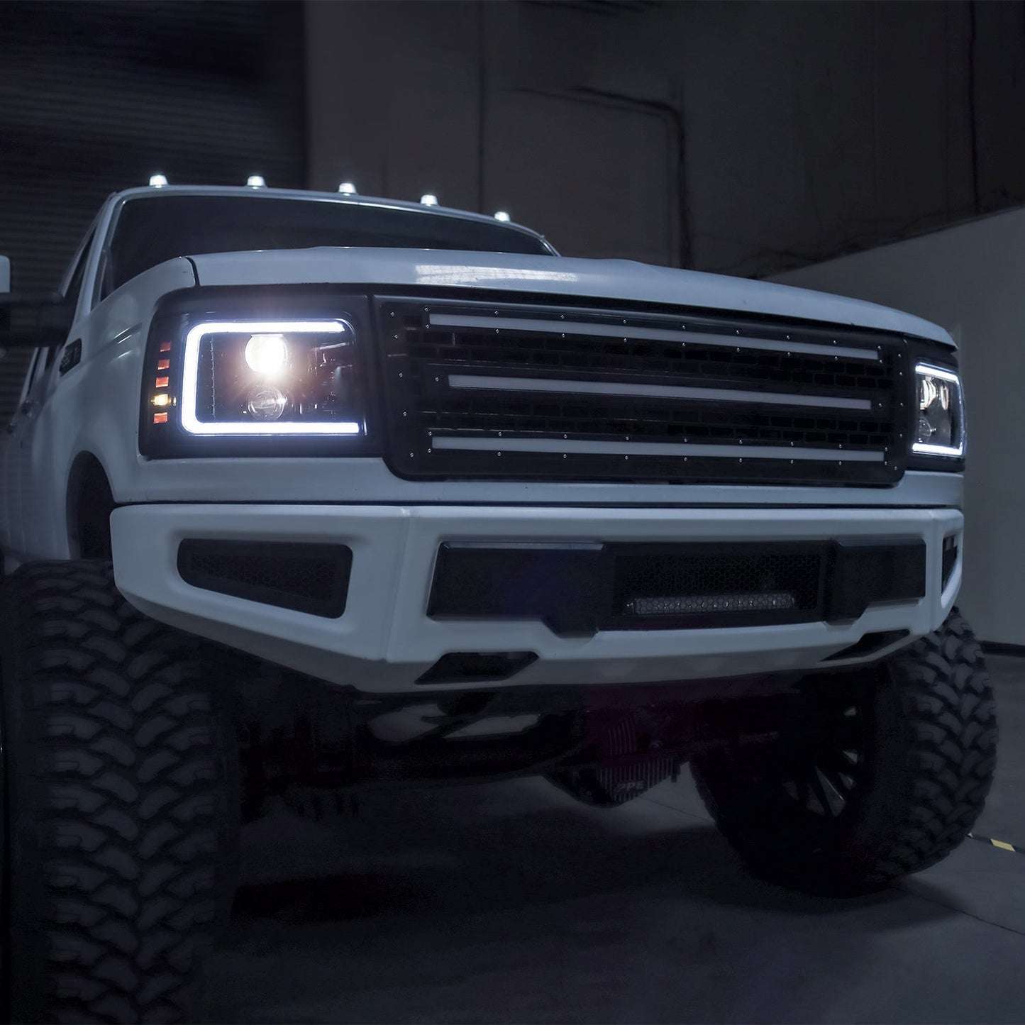 AlphaRex 92-96 Ford F-Series/Bronco LUXX-Series Proj Headlights Blk w/Actv Light SeqSig & SBDRL