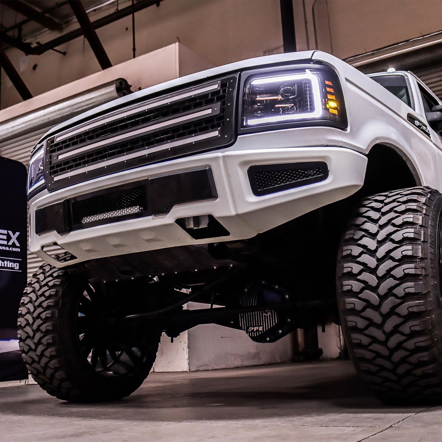 AlphaRex 92-96 Ford F-Series/Bronco LUXX-Series Proj Headlights Blk w/Actv Light SeqSig & SBDRL