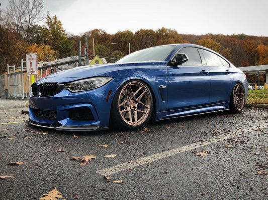 F32 R STYLE FRONT LIP